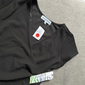 Black large dress from almost famous with styles designed in the front